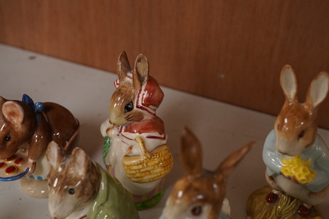 Twenty Beatrix Potter figures, mostly later production figures, largest 11cm high